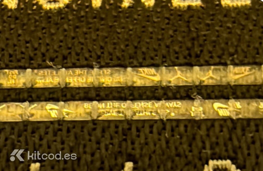 Nike security tag showing metallic strip with holographic effect and embedded SECURITY text - authentic player-spec feature